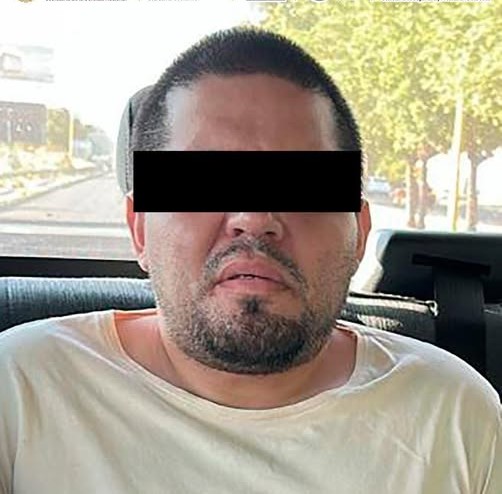 Detenido fugitivo de Estados Unidos.
